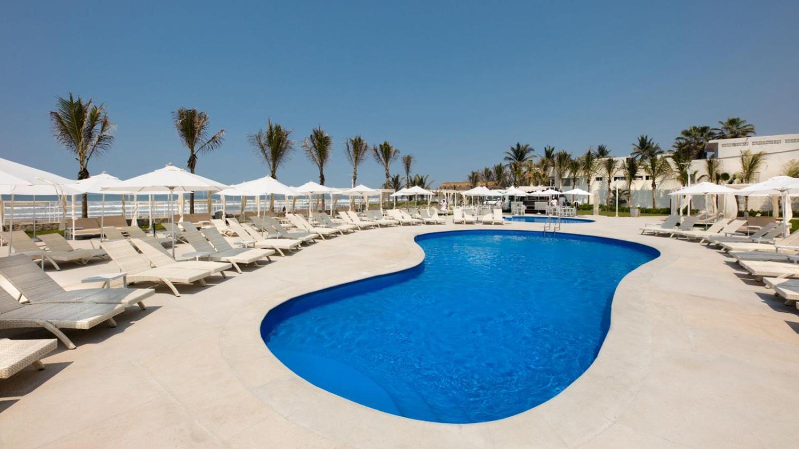 Palacio Mundo Imperial Riviera Diamante אקפולקו מראה חיצוני תמונה The swimming pool at the Iberostar Grand Hotel